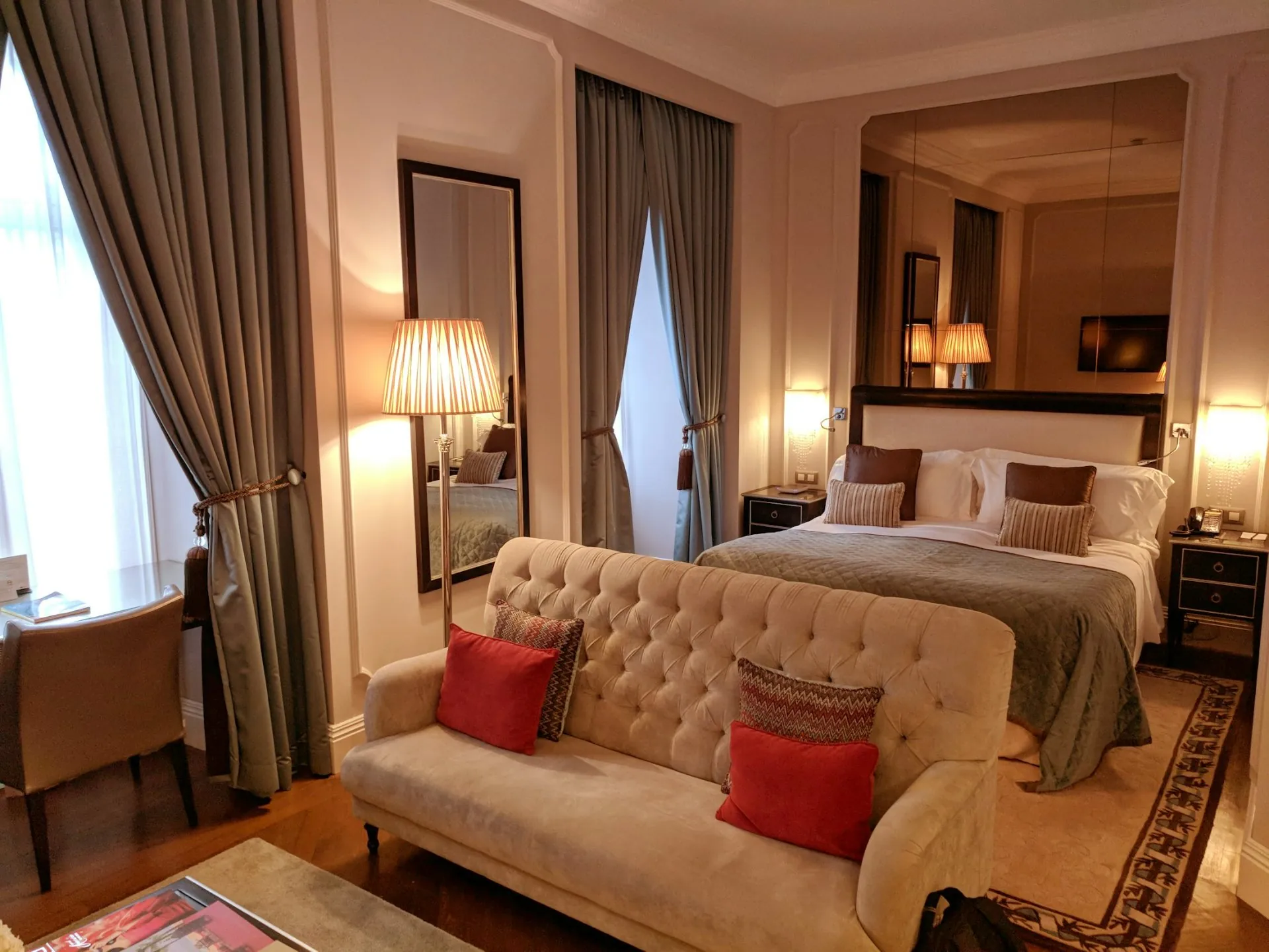 Warm-lit Elyra suite lounge